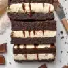 Delicious brownie ice cream sandwiches stacked with layers of rich brownies and creamy ice cream