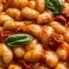 A bowl of butter beans ready to be cooked in a healthy dish.