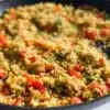 Cauliflower rice with seasoned ground turkey in a vibrant bowl