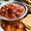Freshly made cherry tomato salsa served with tortilla chips