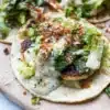 Chicken Caesar Smash Tacos served with fresh ingredients and toppings