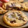 Freshly baked chocolate chip cookies on a cooling rack