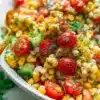 Colorful and fresh corn salad in a bowl with vegetables