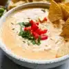 Delicious Cottage Cheese Queso Dip served in a bowl with tortilla chips