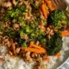 Ground turkey teriyaki stir fry served in a colorful bowl with vegetables.