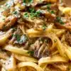 Delicious plate of creamy Oyster Mushroom Pasta garnished with herbs