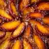 Delicious homemade peach cake with fresh peaches and cream on top