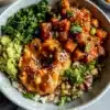 Peanut Sweet Potato Buddha Bowl with vibrant vegetables and toppings