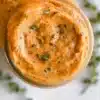 Delicious Tomato Compound Butter spread on fresh bread.