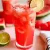 Refreshing Watermelon Agua Fresca in a glass with fresh watermelon slices