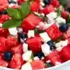 Delicious Watermelon Feta Salad served in a bowl, showcasing vibrant colors.