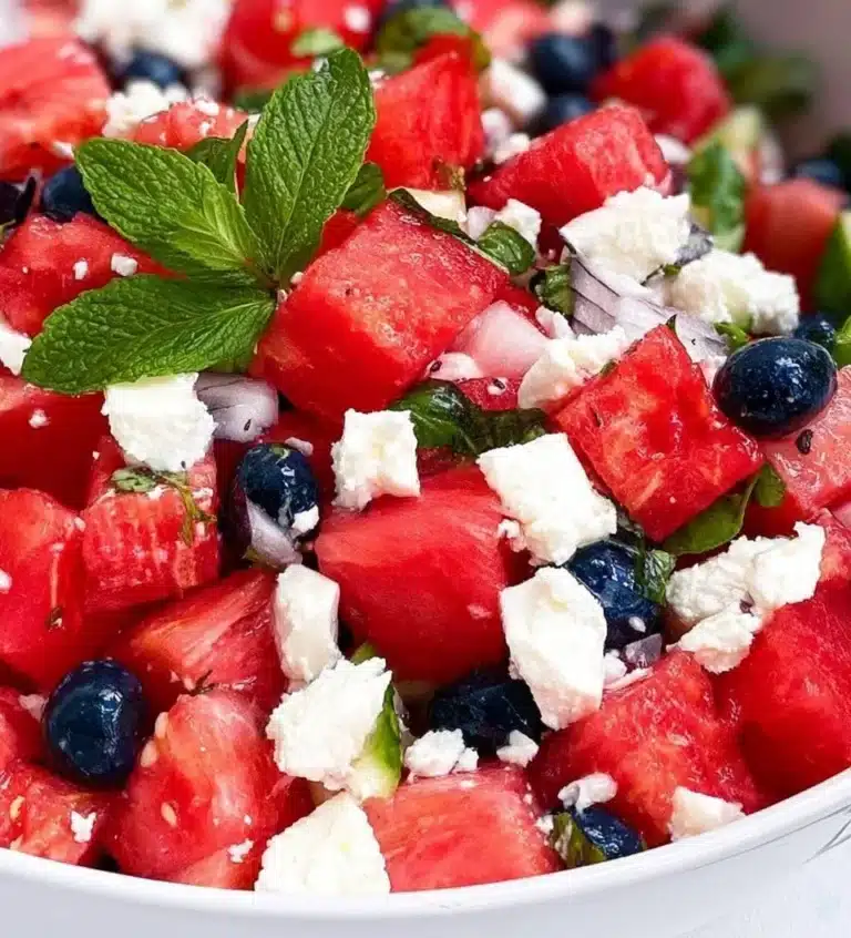 Delicious Watermelon Feta Salad served in a bowl, showcasing vibrant colors.