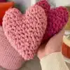 Colorful handcrafted amigurumi hearts for gifting and decoration
