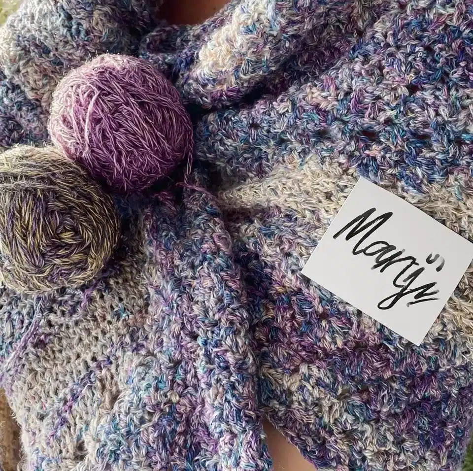Handcrafted crocheted shawl in vibrant colors for stylish warmth
