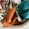 Freshly harvested farmhouse carrots in a rustic basket.