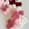 Variety of heart appliques in vibrant colors for crafting and sewing projects