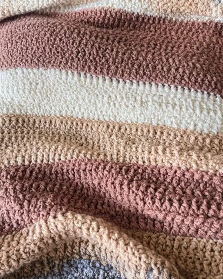 Cozy striped blanket adding style and warmth to home decor